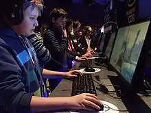 Casual players playing a shooter at the 2013 Intel Extreme Masters in Katowice, Poland.