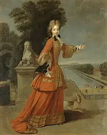 Marie Adélaïde de Savoie, Duchesse de Bourgogne in a scarlet riding habit, with male cuffs, gold trim, buttons, early 18th Century