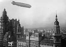 The Graf Zeppelin flying over the building in 1934.