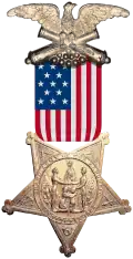 The Grand Army of the Republic badge. Authorized by the U.S. Congress to be worn on the uniform by Union Army veterans.