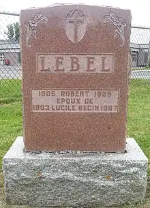 Red granite stone engraved with Lebel's information