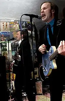 Jamie (left) and Tim Monger play at the Halfass in East Quad at the University of Michigan