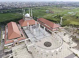 The Grand Mosque of the Masjid Agung in Central Java, Indonesia, features a multi-layered roof typical of Indonesian mosque architecture.