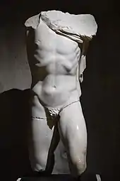 Male torso with legs to the knees, discovered on the site of the Odeon of Lyon in 1964. Marble. Lyon, Lugdunum