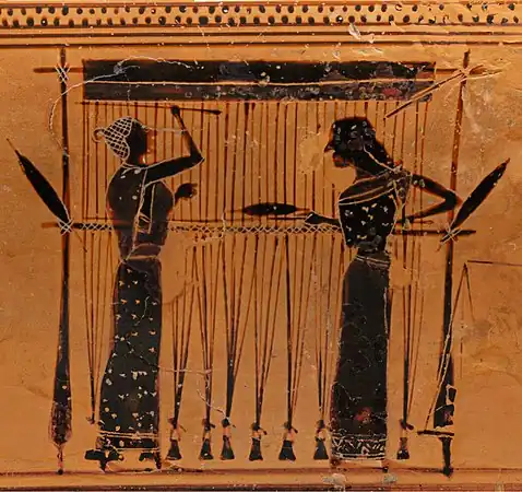 Shuttles are passed, not thrown, through warp-weighted looms. These Ancient Greek weavers have a yarn-wrapped stick.