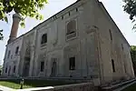 The front facade and west side of the mosque