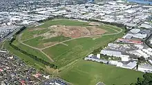 Aerial view of the site of Green Hill in 2009, after being quarried and used as a landfill