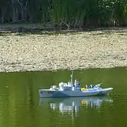 Model of HMCS Sackville in Griffin Pond