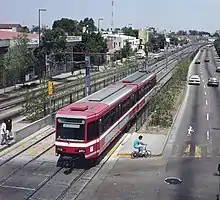 Line 1 runs at-grade south and north of the city center and has several level crossings.