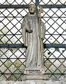 St. William of Volpiano, statue above his tomb in Fécamp Abbey.