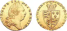A gold coin with a man's head on one side and a crowned heraldic shield on the other