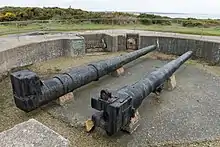 Guns at the Les Landes exhibition, Jersey, 22 cm K 532(f) barrel is on the left