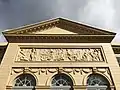 The south façade with its frieze and tympanon.