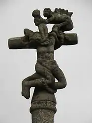 A demon is ready to carry off the soul of the bad robber—part of the Gurunhuel calvary