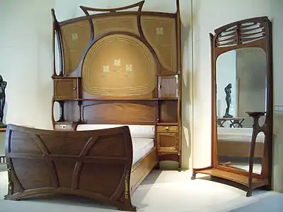 Bed and mirror by Gustave Serrurier-Bovy (1898–99) (Musée d'Orsay)