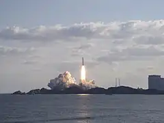 The H-IIA F11 launch vehicle lifting off from Tanegashima Space Center