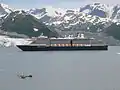 Holland America Line's MS Oosterdam passing Turner Glacier while leaving Disenchantment Bay