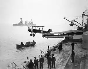 Image 74A Sopwith 1½ Strutter aircraft taking off from a temporary flight deck on the first HMAS Australia, a battle cruiser, in 1918. (from History of the Royal Australian Navy)