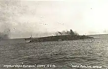 Image 16Australia on her side and sinking during her scuttling in April 1924 (from History of the Royal Australian Navy)