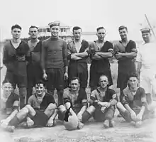 HMS Caradoc football team on Moresby Plain (with Moresby House behind)