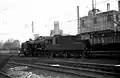 NS 4011 in Utrecht with a passenger train. (1950)