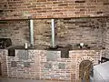Wood-burning stove in what were the enslaved people's kitchen