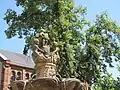 Fontaine aux Abeilles (Fountain of the Bees) in Haguenau, Alsace (18th century.)  The fountain was originally in the Cistercian convent of Neubourg at Dauendorf.