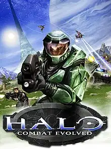 Image of a soldier clad in futuristic green armor, pointing a black weapon towards the camera. Other soldiers and vehicles of war appear in the background. Below the green soldier is a decorative logotype with "HALO" and the subtitle "Combat Evolved", with the BUNGIE logo in the bottom right.