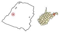 A white line map of Hampshire County with Romney’s location colored red