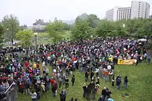 A crowd gathered in a large field