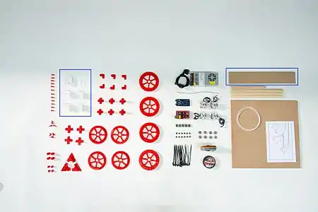 Components of the Hangprinter V3. The red parts and the white parts in the blue box are 3D printed.