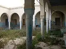 The dilapidated courtyard of the former synagogue