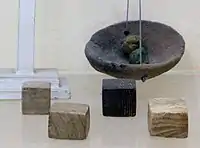 Similar Harappan weights found in the Indus Valley. New Delhi Museum.