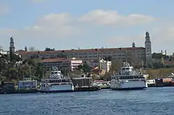 Harem car ferryboat piers with Selimiye Barracks in the background seen from Sea of Marmara.