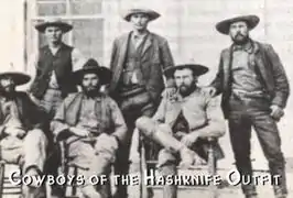 Hashknife Outfit cowboys outside the Bucket of Blood Saloon, circa 1890