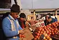 Tomatoes for sale at 3 pounds for 50 cents in 1969