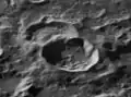 Oblique view of Hayn E crater (below center) and older Hayn J crater (above center)