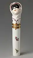 "Toy" needlecase with the head of Columbina, c. 1760, height: 4+7⁄8 inches (12 cm). Inscribed on enamel band on mount: NE SOYEZ POINT CRUELE ("Don't be so cruel")