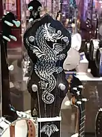 Headstock of Bacon Professional FF 3 Banjo, called the "Chubby Dragon"