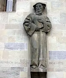 Statuary relief of Heinrich Bullinger on the southern exterior wall