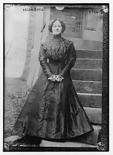 Helen Boyle outside a house