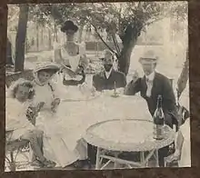 Myron Barlow (second from right) with Henry Ossawa Tanner and Tanner's wife Jessie and son Jessie seated around him.
