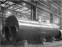 Lancashire boiler 1900, painted with a protective coating, the mountings such as safety valves, stop valve, feed check valves and water level gauges, have been removed.