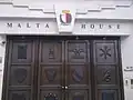Entrance to the High Commission depicting the Coat of arms of Malta