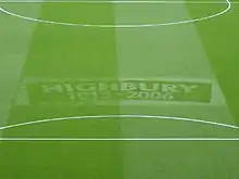 A football pitch with "Highbury 1913–2006" emblazoned on the grass: Arsenal played home matches at Highbury between those years.