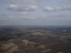 Fields and woods on the hills of Sprigg Township