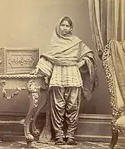 Girl from Karachi, Sind, in narrow Sindhi suthan and cholo. c. 1870.