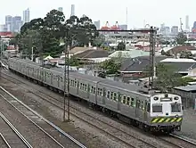 Hitachi in green The Met livery near Middle Footscray