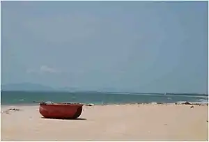 Traditional Vietnamese Fishing Boat on Ho Tram Beach