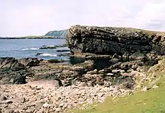 Hog of Breigeo, Ness of Burgi. This geo is typical of the rocky promontory of Ness of Burgi.